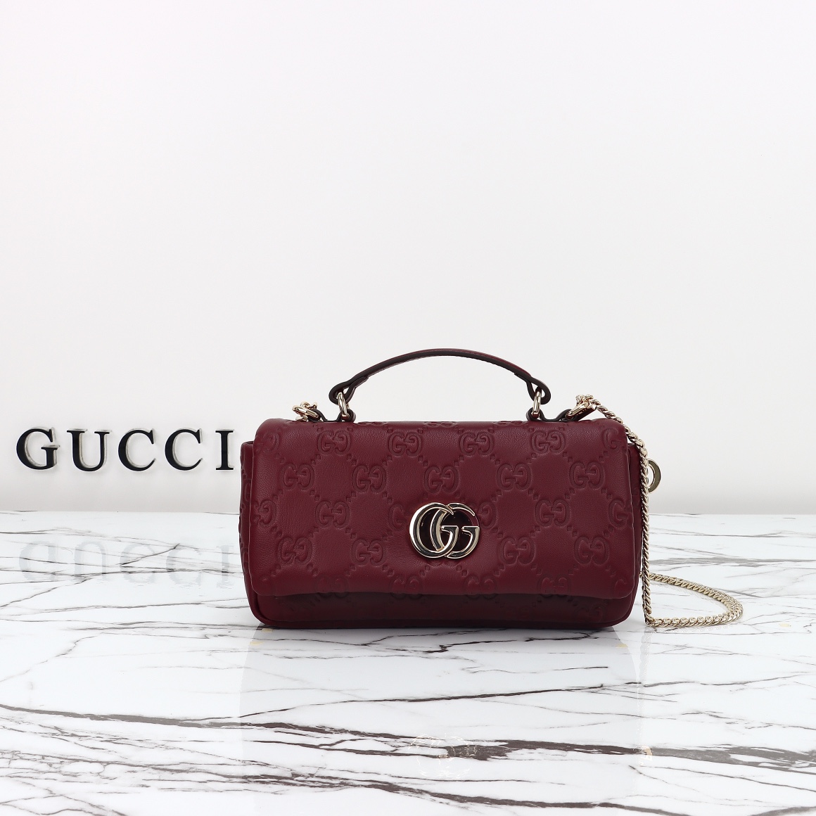 Gucci Burgundy Embossed Leather Bag